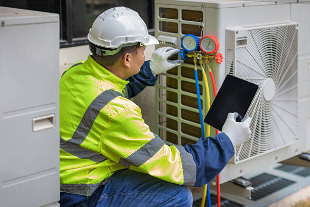 Professional Heat Pump Repair technician working in Elsah, IL